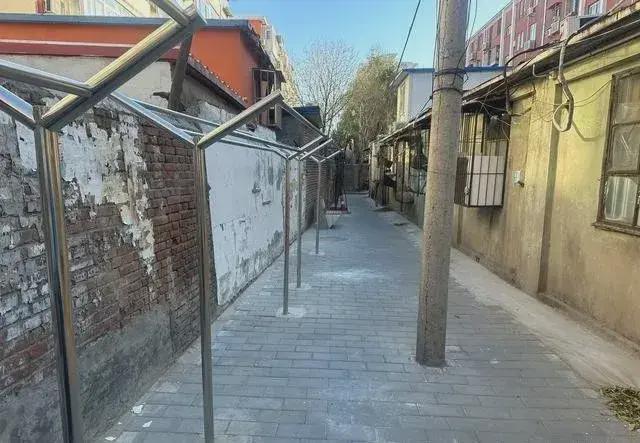 乱建居民想提升小区环境的愿望实现了K8凯发国际拆除700平方米私搭(图4)